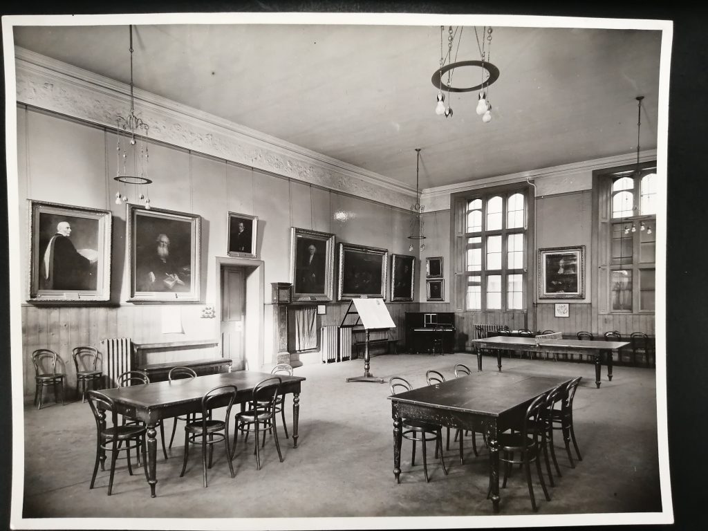 Black and white photo of the Students Common Room in New College from 1946