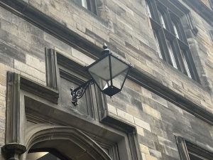 Colour photo of the New College Quad cast iron lanterns